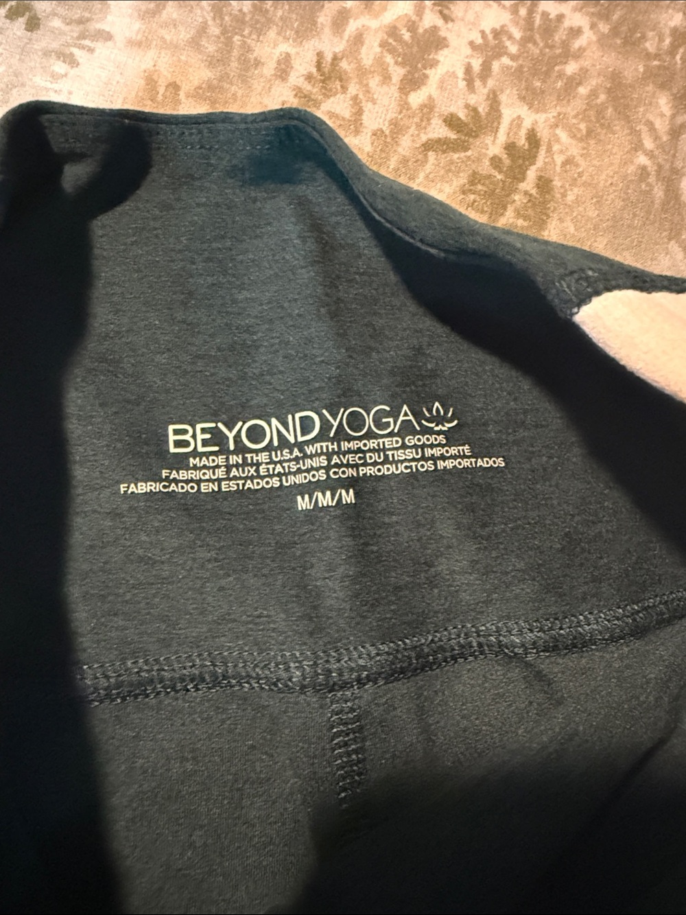 Beyond Yoga Dark Green and Cream Colorblock Leggings - Picture 2 of 4